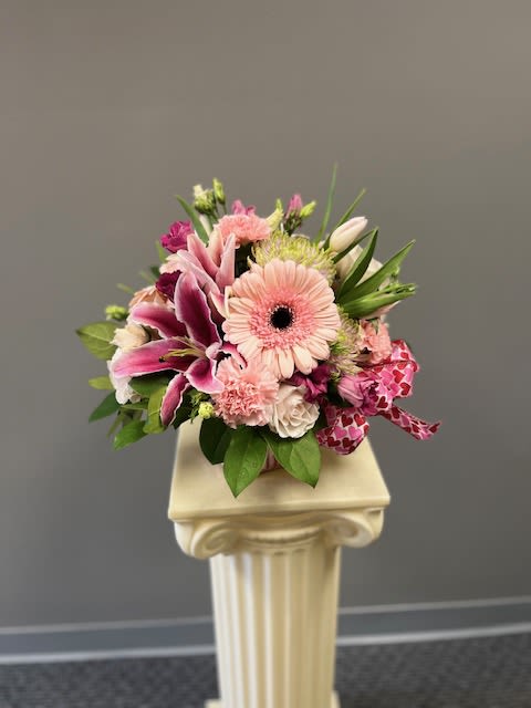 Make Them Blush - Delicate and Breathtaking! A beautiful arrangement of Stargazer Lilies, Gerber Daisies, amongst other gorgeous garden flowers.