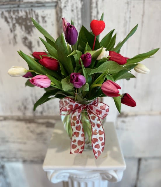 My Growing Love - A vase of tulips in red purple, pink, and white. This is a choice that truly does grow and change just as love does.