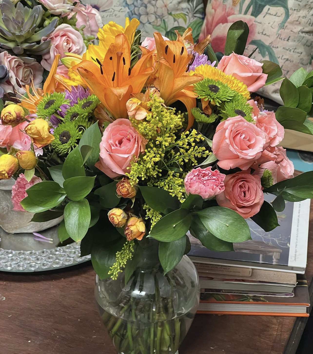 Designers Choice "Autumn is Aproaching" Vase Arrangement - Designers Choice of Fall tones of fresh cut florals in Clear Vase with bow (vase shape &amp; size vary)