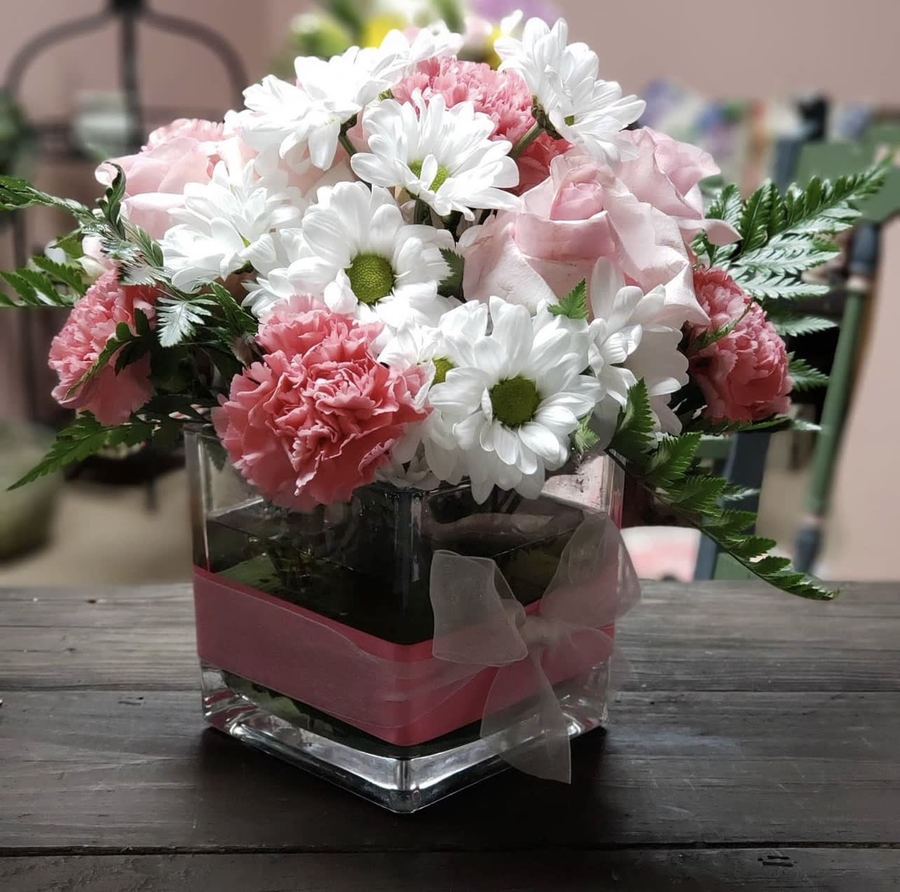 Pink &amp; Dainty Cube Floral Arrangement - Dainty Pink and White DESIGNERS CHOICE OF FLORALS in a small cubed vase with bow.