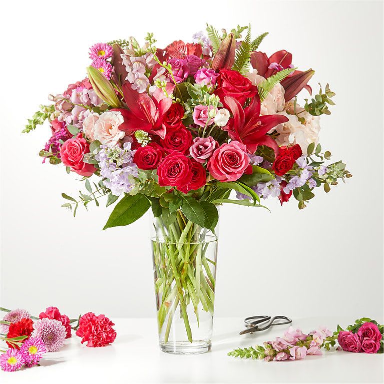 SWOONING OVER YOU - A LUXURY FLORIST ORIGINAL - Romance is alive with this lux florist original, hand-selected florals sure to make their day. Our Florist Originals Bouquets are created by local florists using the finest quality flowers. The actual design you or your recipient will receive will be different from the images shown here.
