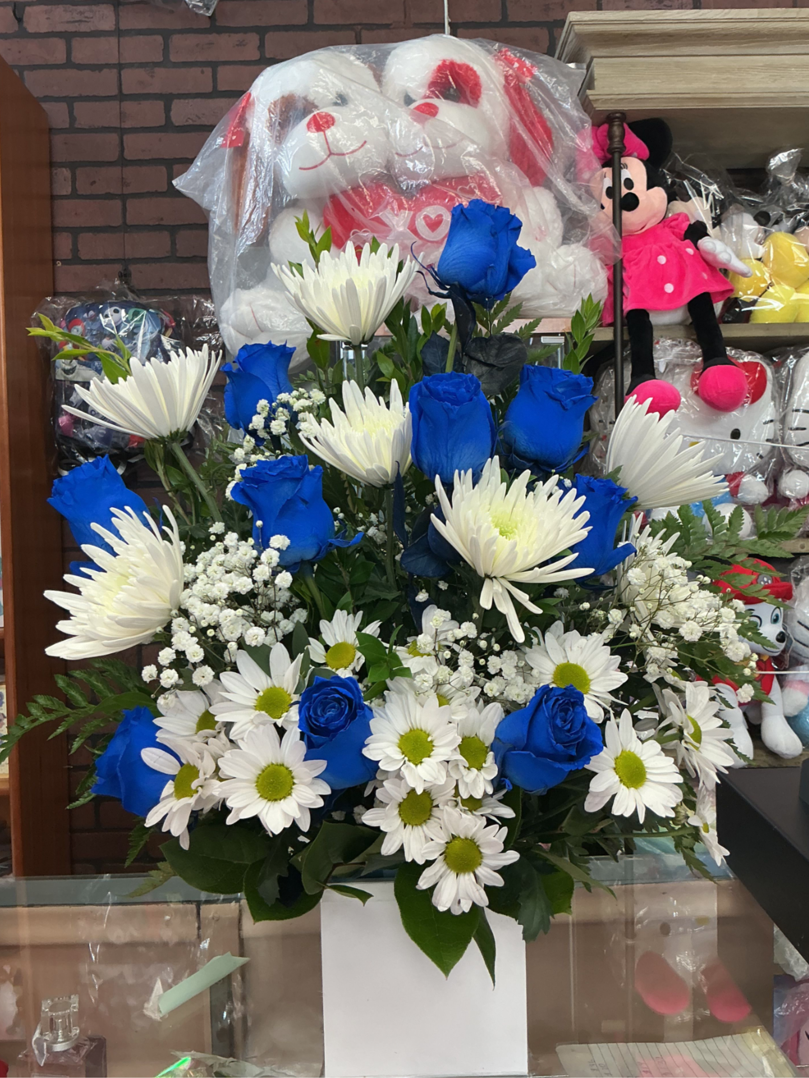 Blue sky  - This is a cute and romantic way to show your men some kind of love specially with blue roses ,daisies ,baby breath and much more .