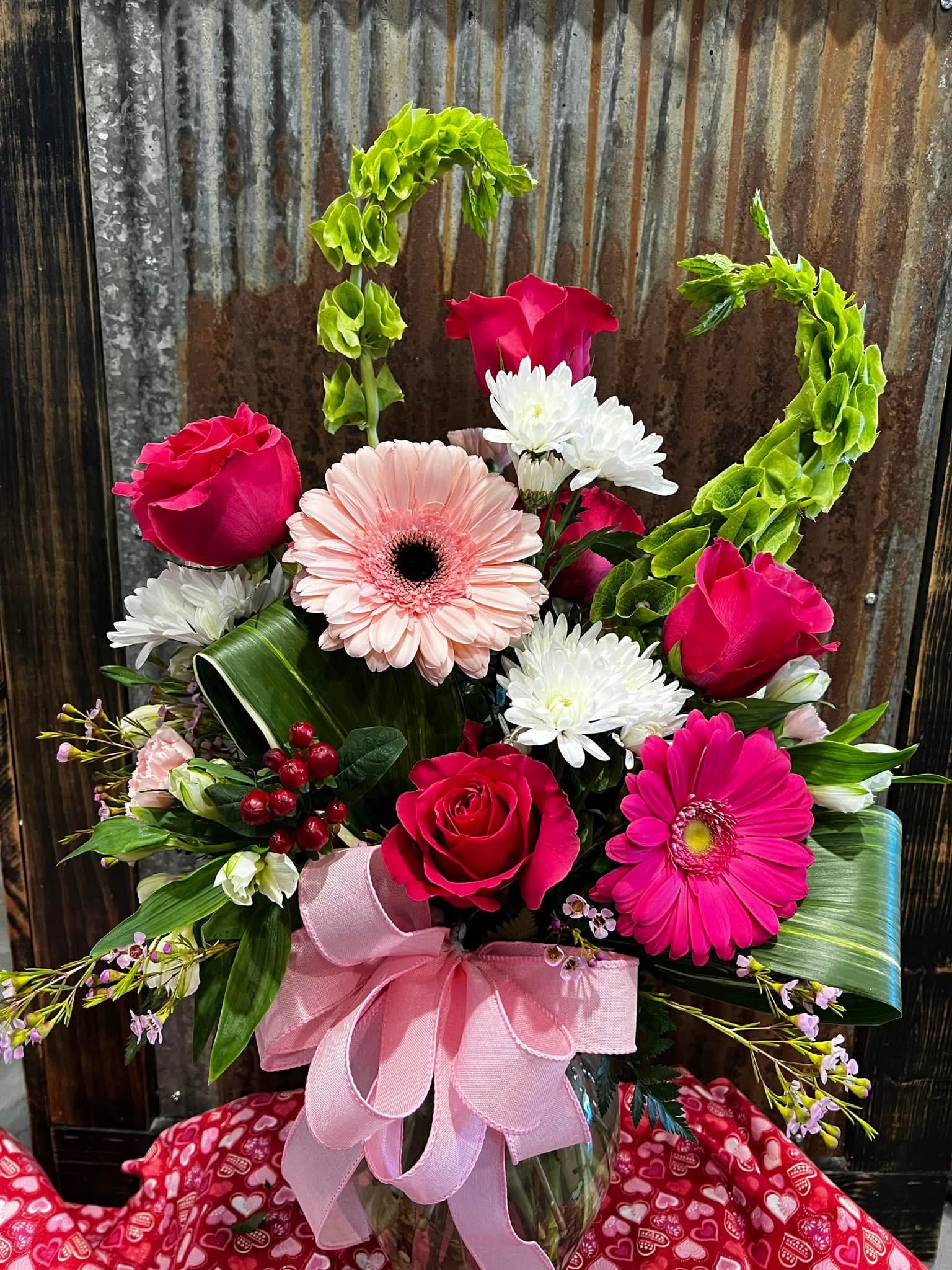 Endless Romance Bouquet  - A cheerful, romantic Valentine’s Arrangement with a fresh, modern feel. A vibrant mix of Pink and Red with White creating a beautiful contrast of bold and delicate tones. 