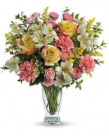 Meant To Be Bouquet - Ring in the spring, celebrate a birthday, or simply show you care with this gorgeously versatile bouquet. Arranged in a stunning vase they'll always treasure, this lovely mix of yellow roses and pink carnations warms everyone's heart. Yellow roses, pink carnations, white alstroemeria and pink asters are accented with solidago and oregonia. Delivered in a Couture vase. 