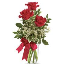 Cherished Three (AVAILABLE FOR IN-STORE PICKUP ONLY) - A perfect expression of understated elegance, this charming arrangement features three premium long-stemmed roses in your choice of color—whether passionate red, soft pink, pure white, or any hue that speaks to the moment.  Please let us know in "notes" section of order, which color you would like.  Vase, filler, and ribbon may vary due to availability.