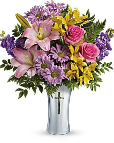 Bright Life Bouquet - Show them how much you care with this beautifully bright yet reverent arrangement of roses, lilies and alstroemeria. Gracefully presented in a shining, silver-finished ceramic vase with cross cut-out - a touching tribute to a bright life. This glorious arrangement includes hot pink roses, pink asiatic lilies, yellow alstroemeria, lavender stock, lavender daisy spray chrysanthemums, huckleberry and leatherleaf fern. Delivered in a Shining Cross vase. 