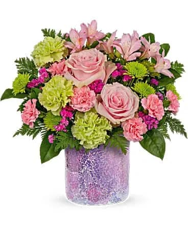 Forever Shining Bouquet - Pure sparkle! Sure to make mom's heart shine, this glamorous mosaic glass vase shimmers beneath a beautiful bouquet of pink and green blooms. Pink roses, green carnations, pink alstroemeria, miniature pink carnations, raspberry sinuata statice and green cushion spray chrysanthemums are arranged with lemon leaf and leatherleaf fern. Delivered in a Shining Beauty cylinder. 