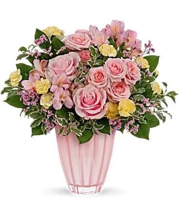 Gorgeous Grace Bouquet - A gift of style and grace, this gorgeous Mother's Day bouquet of ballet pink roses in a keepsake vase of shimmering European glass is sure to take her breath away. This pretty bouquet features pink roses, pink spray roses, pink alstroemeria, miniature light yellow carnations, pink limonium, lemon leaf and pitta negra. Delivered in a Dancing Beauty vase. 
