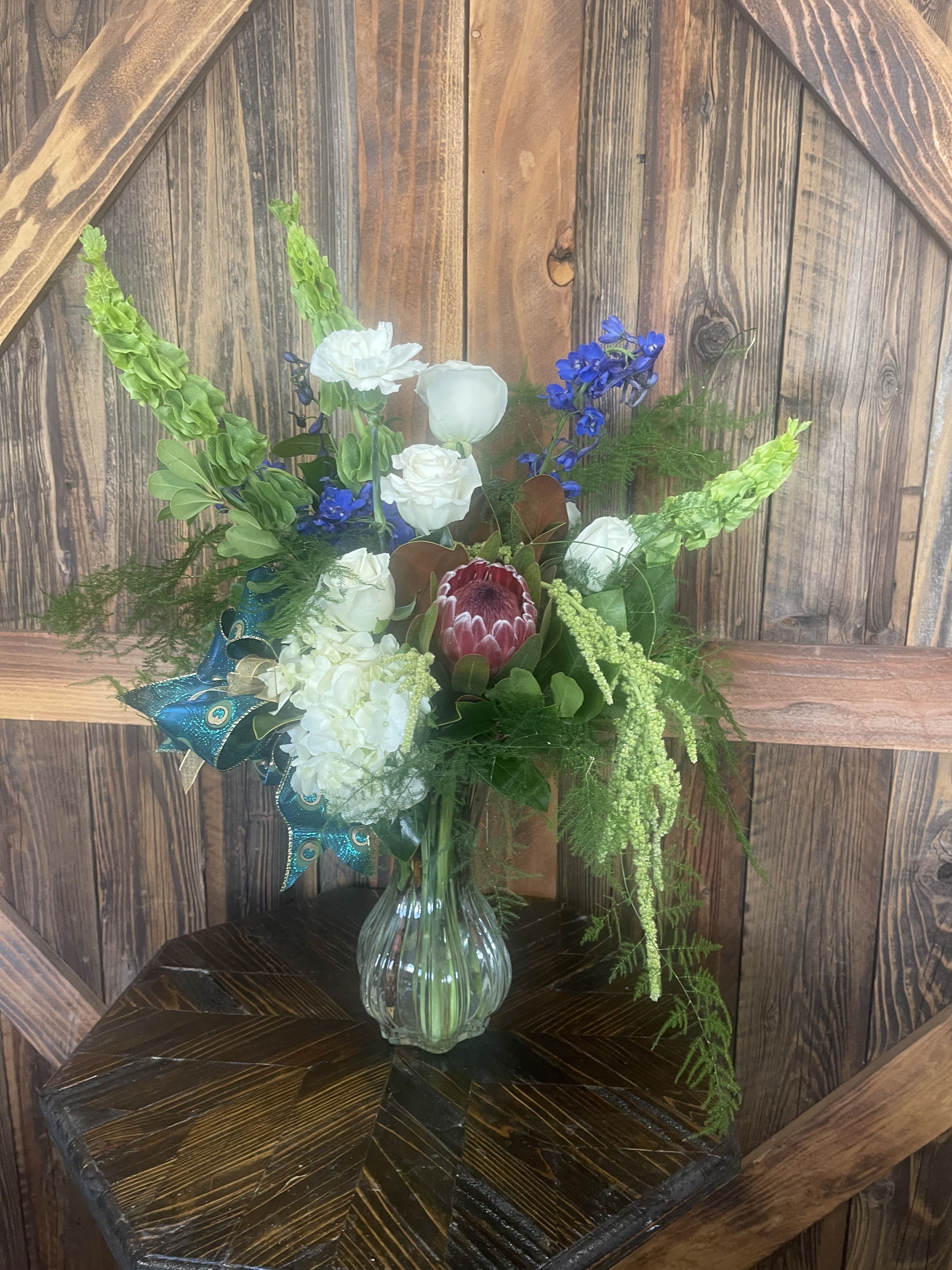 Peacock Beauty - Joyous to look at…Everyone enjoys this arrangement.