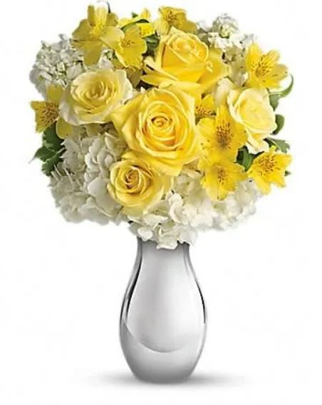 So Pretty Bouquet - This bouquet is called "So Pretty" because it is s-o-o-o pretty. She'll love the soft yellow roses, white hydrangea and other favorites - so artistically arranged in the dazzling Silver Reflections vase. Expect one of her biggest smiles ever. The sunny bouquet includes white hydrangea, light yellow roses, yellow alstroemeria and white stock accented with fresh greenery. Delivered in Teleflora's exclusive Silver Reflections vase. 