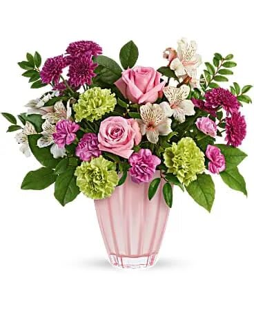 Sweet Serenade Bouquet - Sure to make mom's heart sing, this magnificent Mother's Day gift features a beautiful rose bouquet in a glorious European glass vase with sparkling metallic finish. This arrangement includes pink roses, light pink alstroemeria, green carnations, miniature pink carnations, purple cushion spray chrysanthemums, huckleberry and lemon leaf. Delivered in a Dancing Beauty vase. 