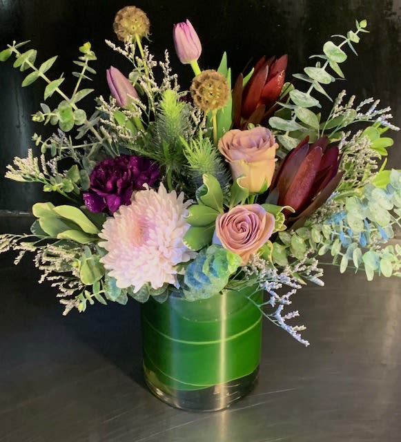 The Miss Stormy Sky - A vibey mix of lavenders and grays make up this modern mix. Show you are thinking of them with this petit vase design.