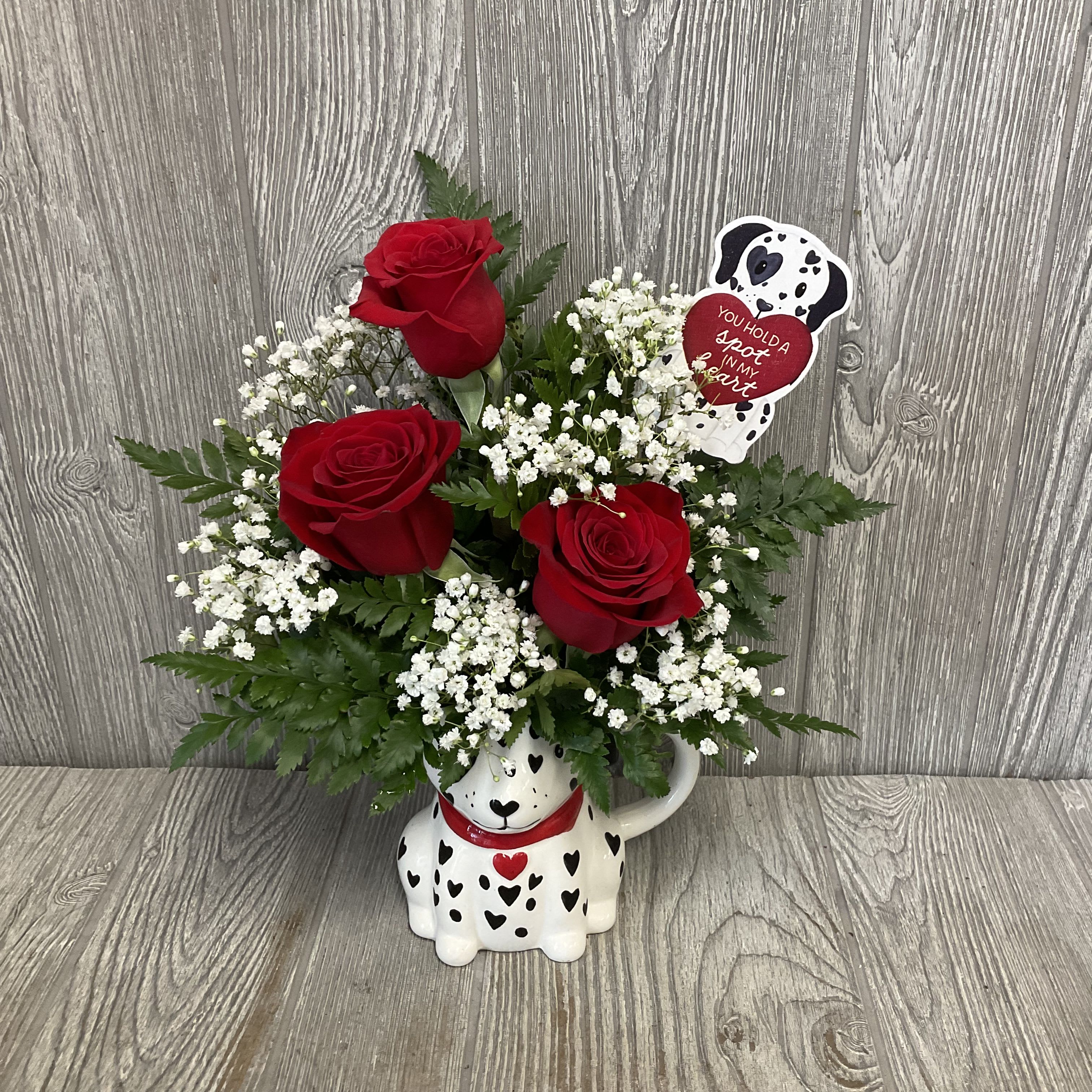 101 Reasons I Love You - Beautiful fresh cut red roses arranged in an adorable keepsake ceramic Valentine’s Dalmatian mug. Flowers and colors may vary. 