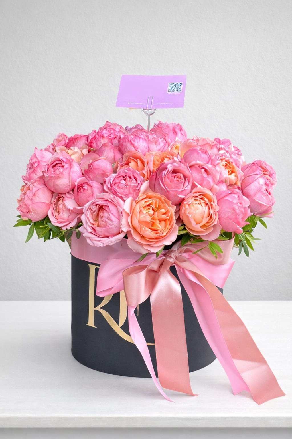 Petal charm deluxe box - A delightful box of peony-type garden spray roses and lush greenery, perfect for a sweet and timeless gesture.