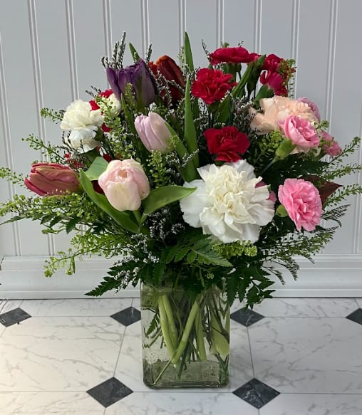 Tulip Harmony - Elegant and cheerful, Tulip Harmony is a delightful blend of beautiful Holland tulips and mixed blooms, creating a perfect balance of color and beauty for any occasion.