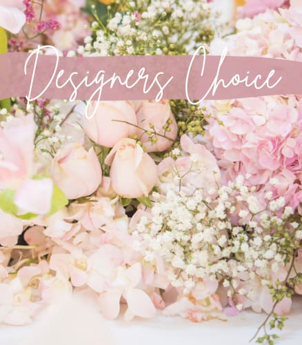 Designer's Choice Blush Beauty - Designer’s Choice – Blush Beauty Soft, romantic, and beautifully curated, our Designer’s Choice: Blush Beauty arrangement is a florist-designed creation crafted using a delicate palette of blush, soft pinks, creamy ivories, and gentle greenery. Each arrangement is thoughtfully designed by our floral artists using the freshest seasonal blooms available, making every piece one-of-a-kind while staying true to a light, feminine pastel aesthetic. Perfect for birthdays, new beginnings, thank-you gifts, sympathy gestures, or “just because,” this arrangement allows our designers the creative freedom to showcase their signature style while ensuring a cohesive, elegant look. Flowers and containers may vary, but the overall feel remains timeless, airy, and beautifully balanced. Details: Custom designer arrangement in a pink pastel color palette Flowers selected based on seasonal availability Designed in a coordinating vase or container Each arrangement is unique and handcrafted with care Trust our designers to create something truly special—a soft, pastel expression of beauty made just for your occasion.