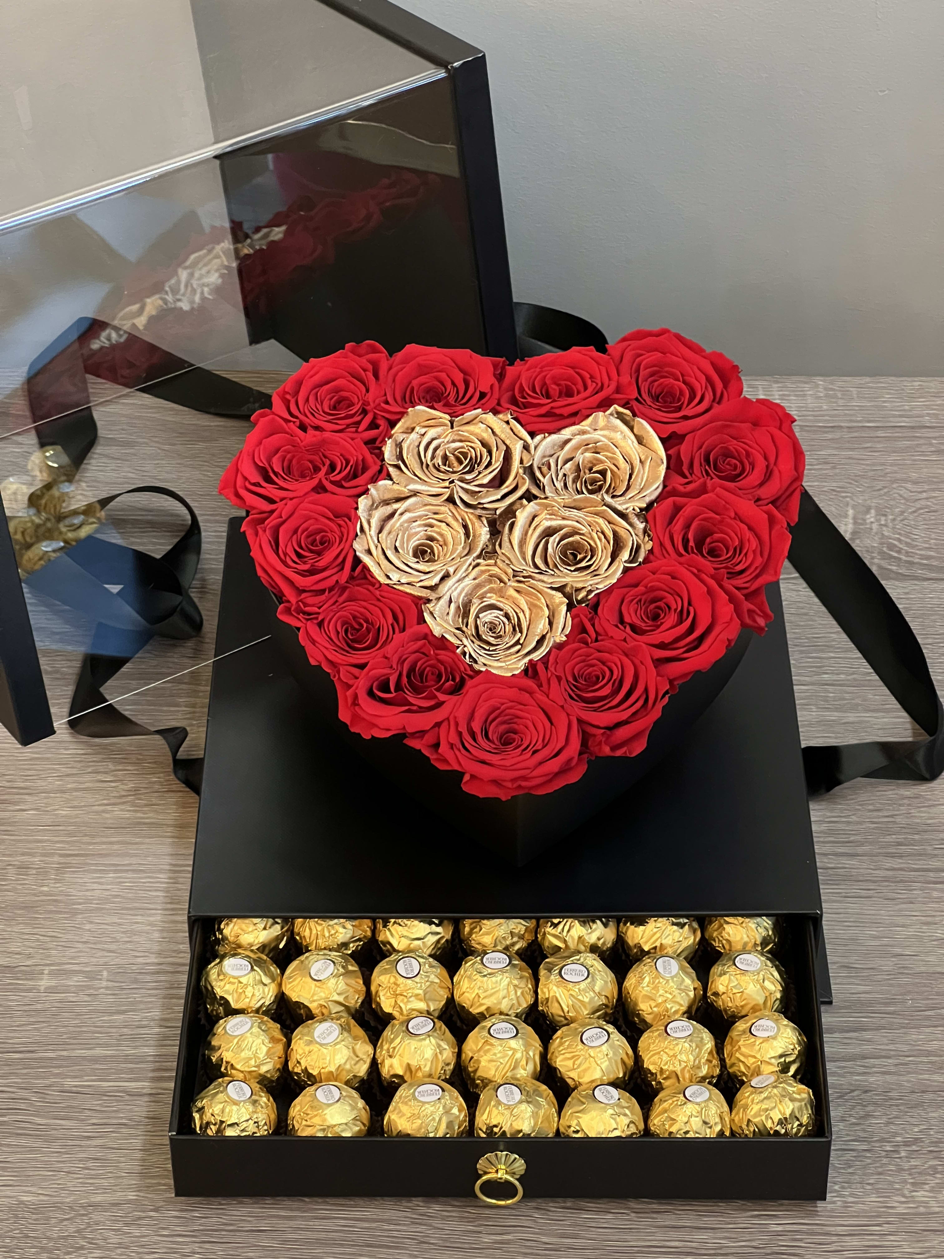 Love Story ™ - Arrangement of long lasting preserved roses and Ferrero Rocher chocolates in an acrylic display box 