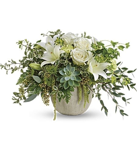 Flourishing Beauty Bouquet - Bring flourishing beauty to any occasion with this naturally elegant arrangement of fresh white flowers, fresh succulents and delicate greens. The wildly chic arrangement is presented to perfection in a charming weathered pot. 