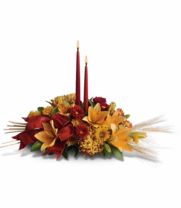 Graceful Glow Centerpiece - Make Thanksgiving all the more special by bringing a graceful glow to the table. Everyone will be filled with gratitude in the presence of such beauty.