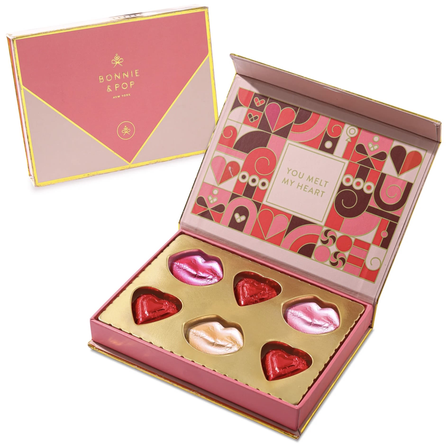 A Love Letter Chocolate Box - This charming pink cardboard box, shaped like an envelope, opens to reveal a delectable assortment of chocolates molded into hearts and lips.   * Each sweet treat is crafted with love, and the box carries a heartfelt message that reads "You Melt My Heart."   * Surprise your loved one with this delightful combination of romance and chocolate, making it a truly memorable and delicious gesture.  Bonnie &amp; Pop NY