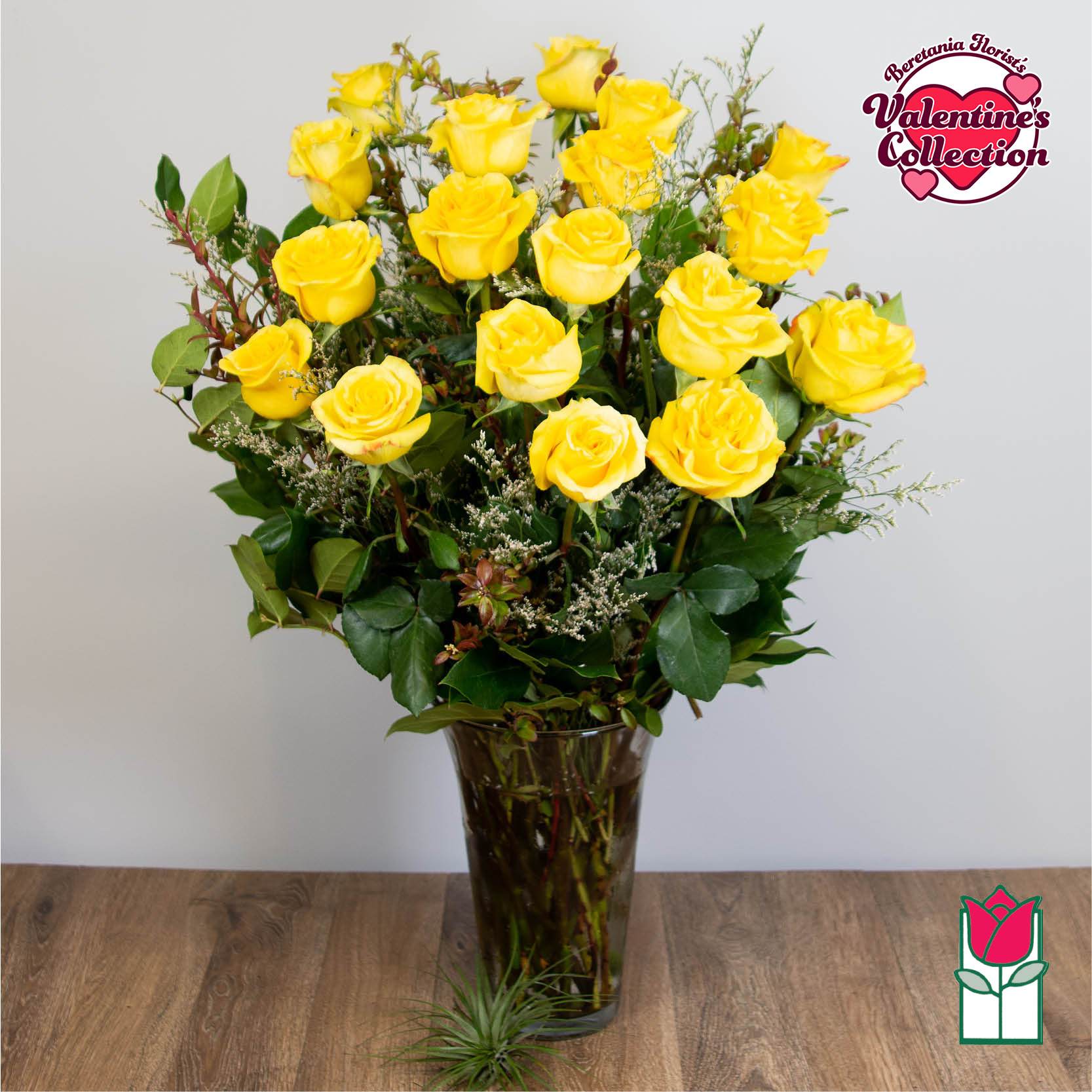 [Valentine's] Beretania's 1.5 Dozen Yellow Rose Bouquet [Early Bird Special] - 1.5 Dozen Premium Long Stem Yellow Roses  The Beretania Florist one and a half dozen extra long stem premium Roses arranged in a glass vase with assorted foliage.  We feature premium 70cm Ecuadorian extra-fancy Roses, which is 30% larger than any other rose in the islands.  Nothing speaks of love so much as a bouquet of beautiful yellow roses. Arranged with seeded eucalyptus in a classic glass vase, this bouquet is a gift to her heart from yours. Approx. 32h x 18w 