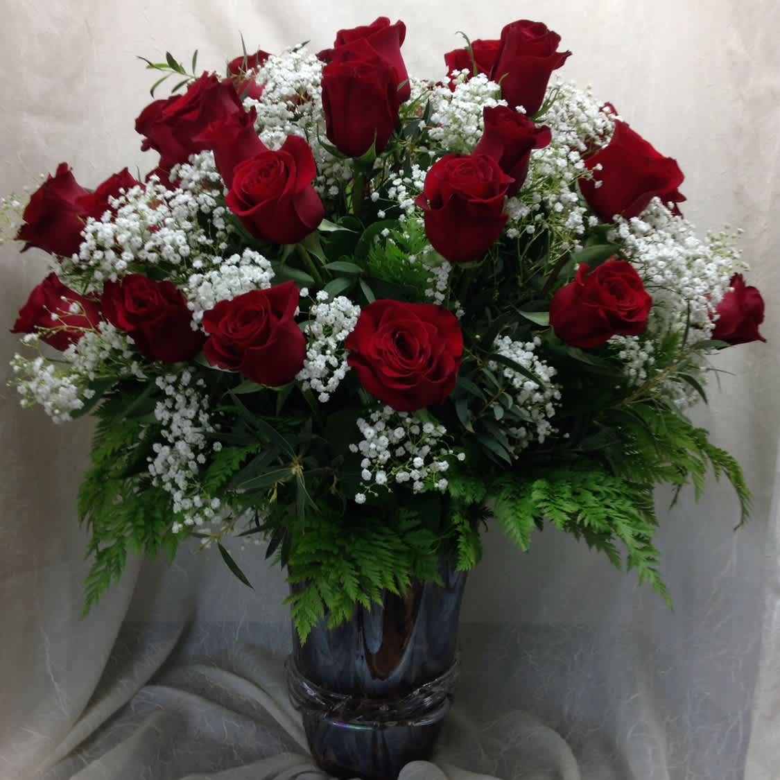 Double Dozen - When a dozen roses just isn't enough to show how much you care, send this extraordinary bouquet featuring our premium long stem roses.  24 of them!  The best way to melt a heart!
