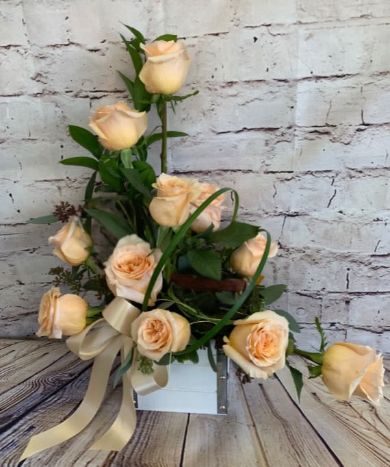 Shimmering Love - Show your love with this stylized design featuring a dozen Peach shimmer roses.