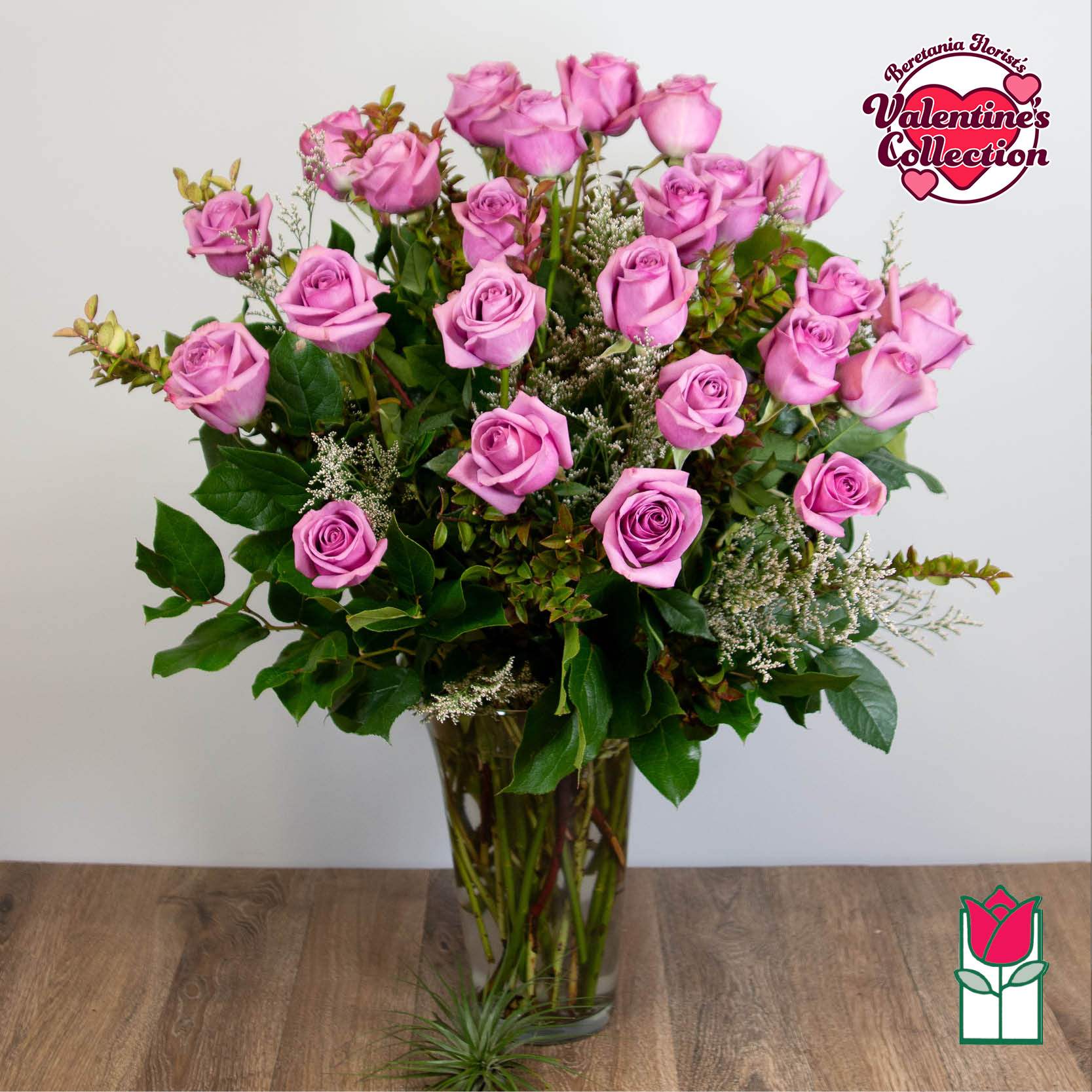 [Valentine's] Beretania's 2 Dozen Lavender Rose Bouquet [Early Bird Special] - 2 Dozen Premium Long Stem Lavender Roses  The Beretania Florist two dozen extra long stem premium Roses arranged in a glass vase with assorted foliage.  We feature premium 70cm Ecuadorian extra-fancy Roses, which is 30% larger that any other rose in the islands.  Nothing speaks of love so much as a bouquet of beautiful Lavender roses. Arranged with seeded eucalyptus in a classic glass vase, this bouquet is a gift to her heart from yours. Approx. 32h x 18w 
