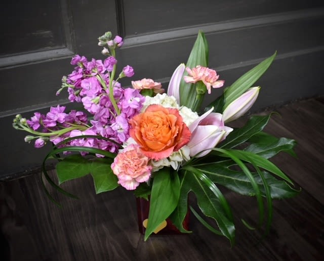 Pillow Talk - Available for Local St. Cloud, MN Delivery Only - Pillow Talk whispers sweet nothings with every bloom. Peach roses, lovely pink lilies, and stock come together to create a romantic, serene display that evokes the warmth and intimacy of quiet moments shared with someone special. This bouquet is the perfect expression of love, tenderness, and affection—just like the cozy conversations that linger long after the day is done.