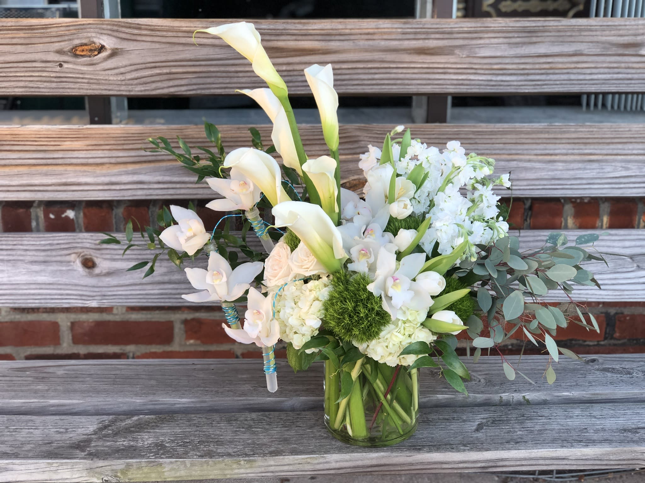 Diamond  - all white flowers include calla lilies, hydrangeas, orchids and others.