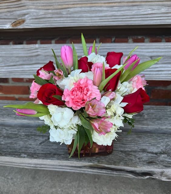 Be mine - red roses, tulips (color based on availability), hydrangea, alstromeria