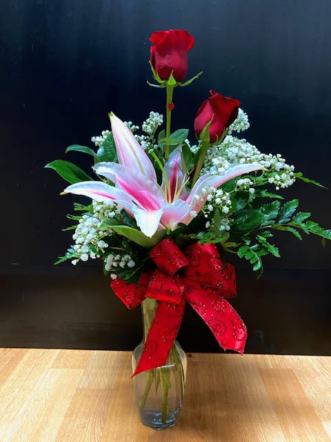 Double Rose and Lily  - Two roses representing your relationship and a lily for fragrance.