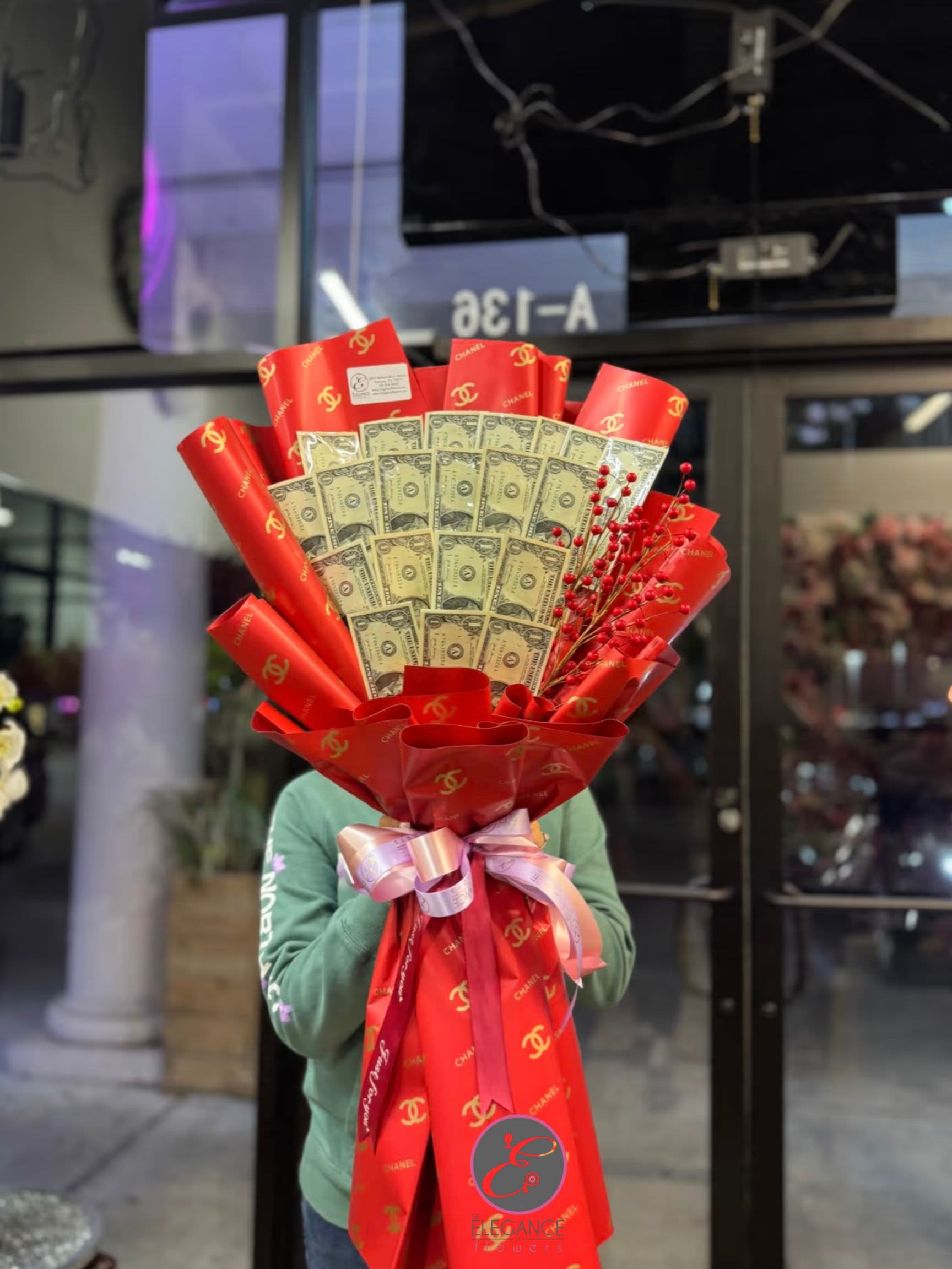 Money Bouquet #1 - Includes $1x 20 ($20), Please place your order 2–3 days in advance to ensure availability.  For questions, call us at 281-564-2600.. Money bouquets are unique arrangements featuring dollar bills. They make a creative and luxurious gift for special occasions like birthdays, anniversary, or graduations, combining elegance with practicality.