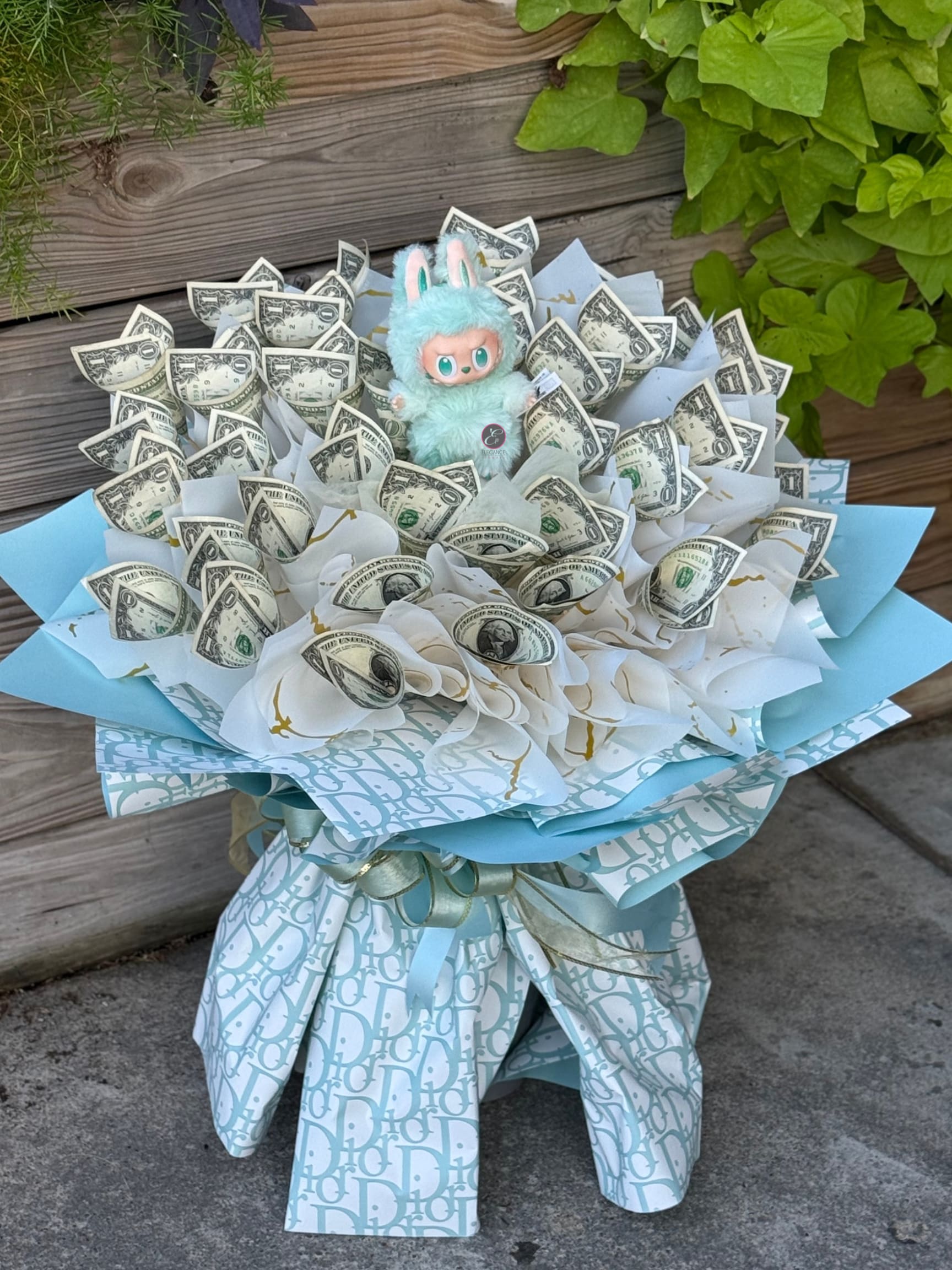 Money Bouquet: Big into Energy #1  - Cash Value: $35  Please place your order 2–3 days in advance to ensure availability. For questions, call us at 281-564-2600.