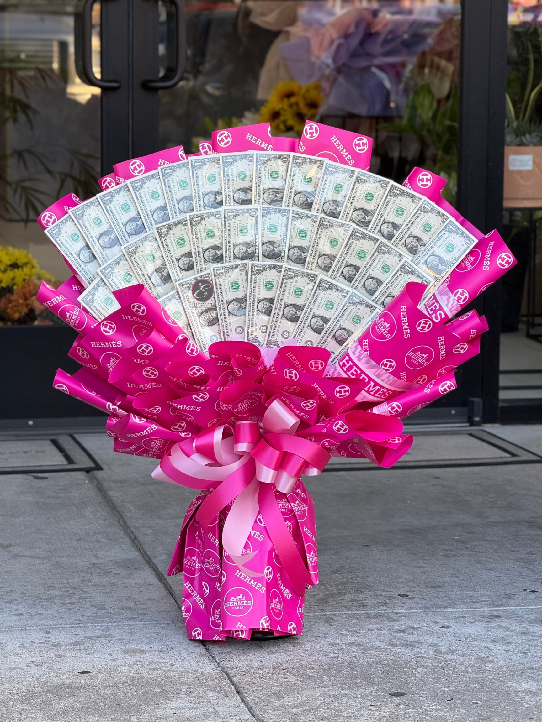 Money Bouquet #23  - Cash Value: $35  Please place your order 2–3 days in advance to ensure availability. For questions, call us at 281-564-2600