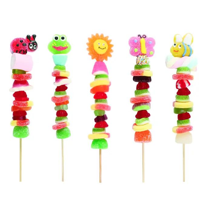 Gummy Kabob - Fun and Delicious! We can add kabobs to your flower or plant arrangement! Price shown is for one kabob. Top gummy piece varies. 12" tall.