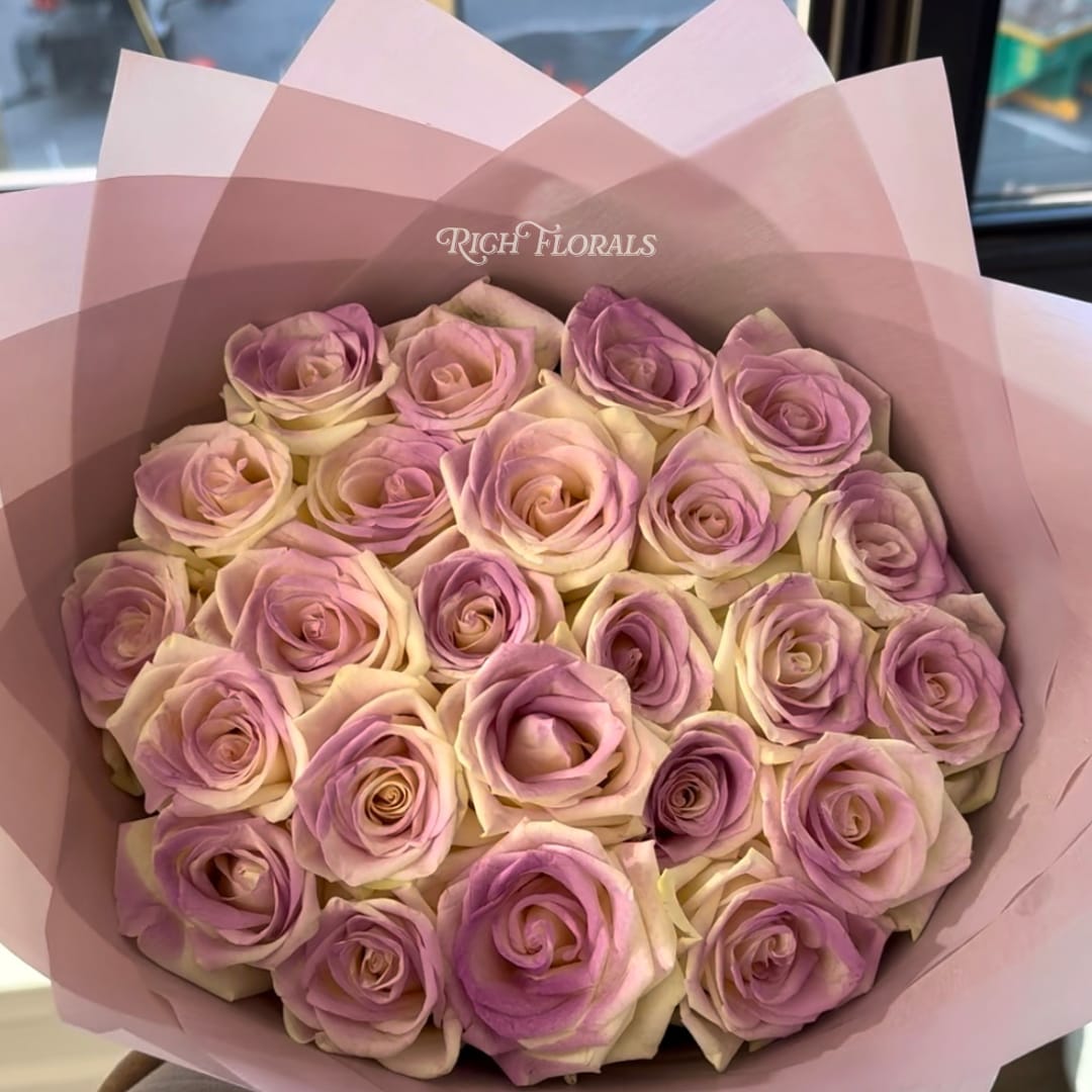 Lavender Dream - Meet Lavender Dream—white roses kissed with a touch of lavender, wrapped in iridescent lavender floral paper.  Now on our site in 25, 50, or 75 count, bringing soft lavender vibes to every occasion!