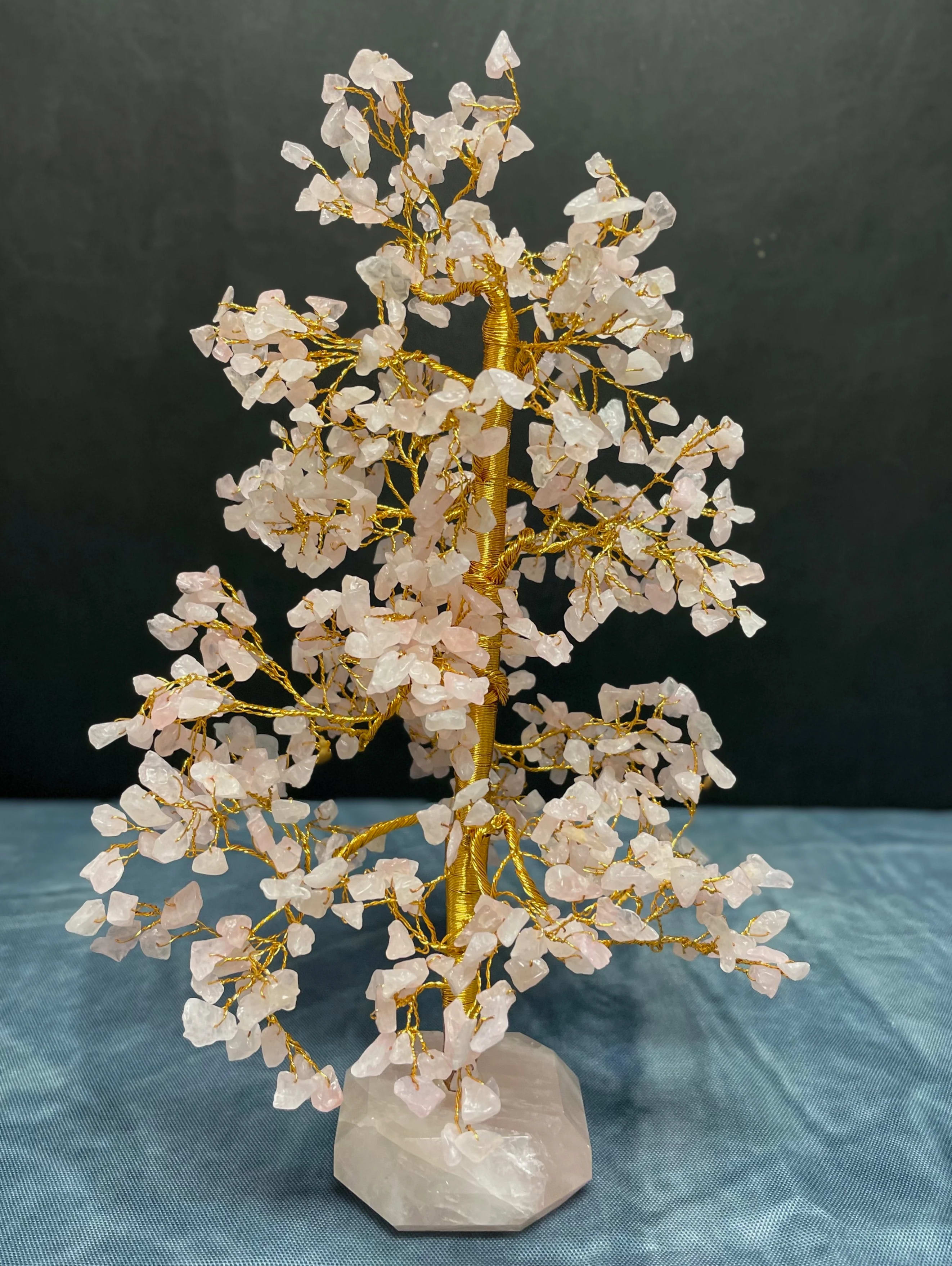 12" Rose Quartz - In love’s warm embrace, we are transformed into our full potential. As the stone of unconditional love, you can count on Rose Quartz to be there for you no matter what kind of love your heart needs. Whether you could use an infusion of self-love, romantic love, familial love, or love of friends, our "You Are Loved - Rose Quartz Stone Feng Shui Tree" will connect with your heart chakra to fill it with loving energy. 