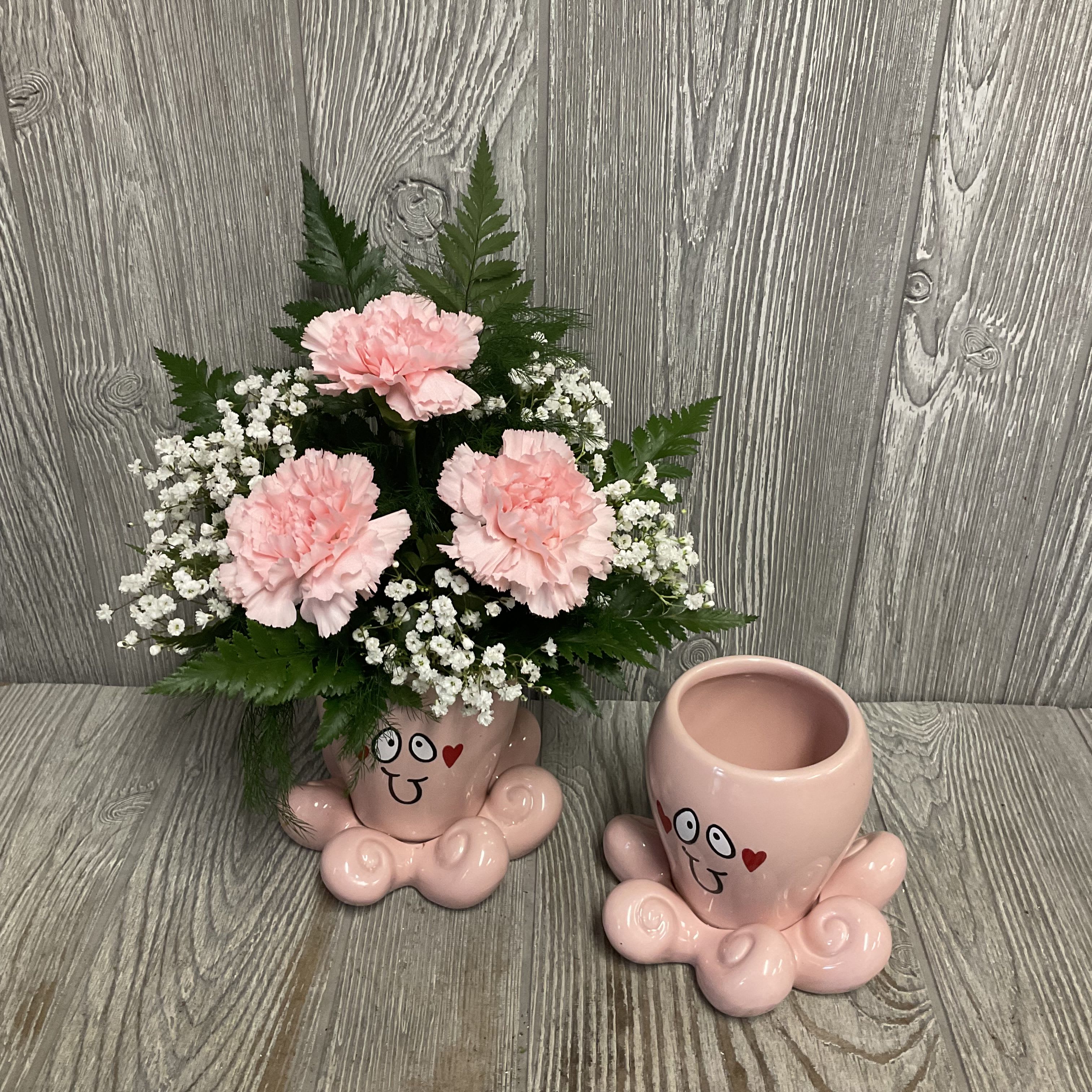 With Love - Fresh cut flowers arranged in a keepsake ceramic Valentine’s octopus container. Flowers and colors may vary. 