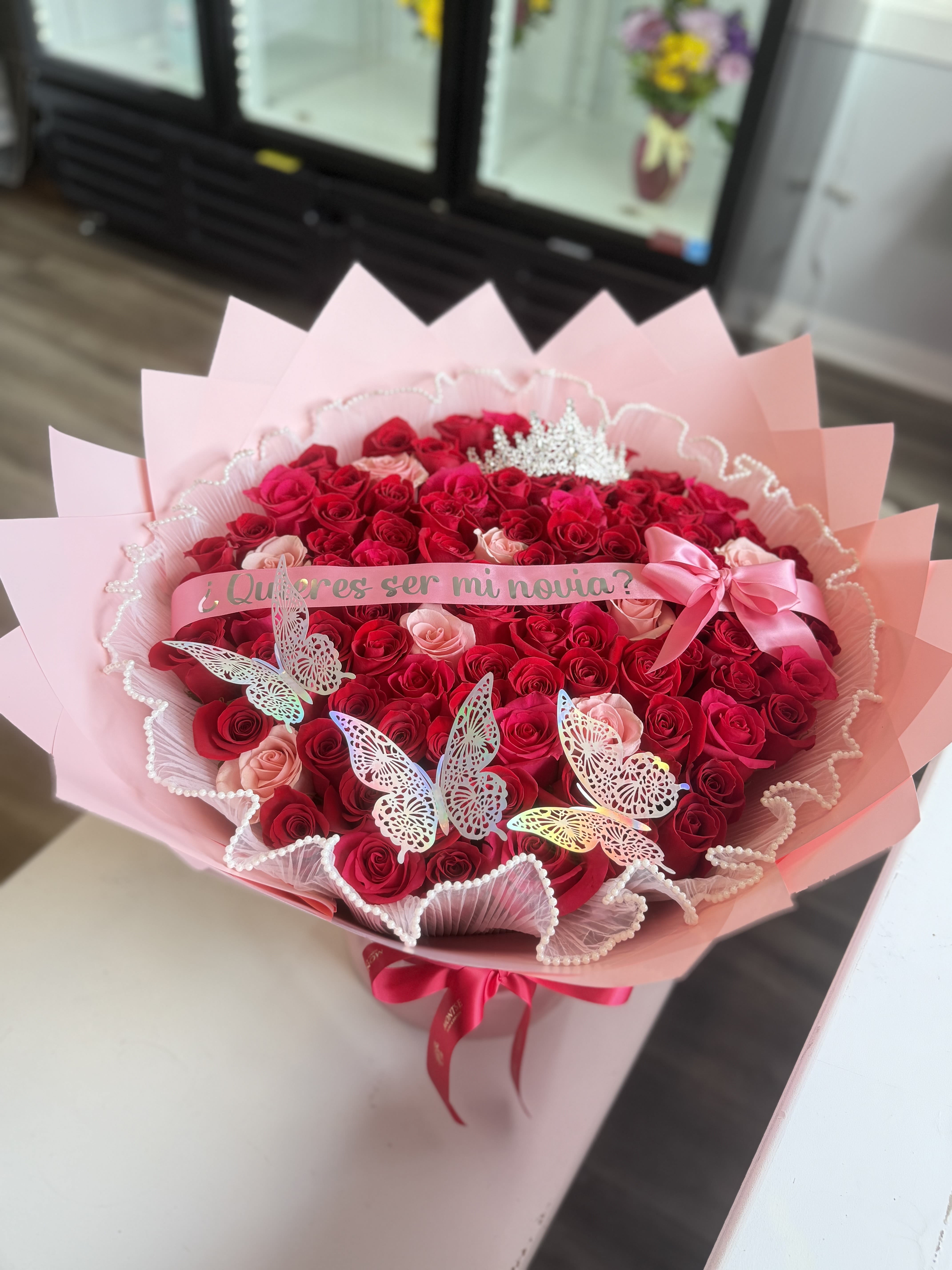 Pink and Red Ramo  - 100 pink and red roses with a custom ribbon 