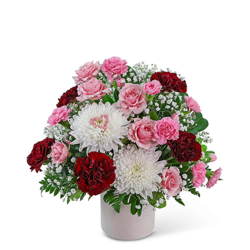 Heartfelt Harmony - Heartfelt Harmony is a romantic floral design featuring Cremons, Carnations, Roses, Baby's Breath, and premium foliage. It exudes timeless charm with its dark burgundy, white, and pink tones nestled in a modern white vase. An extra touch of love is shown through a delicate pink heart created with pink pins on one of the floral blooms, making it a romantic gift for Valentine's Day or an anniversary.