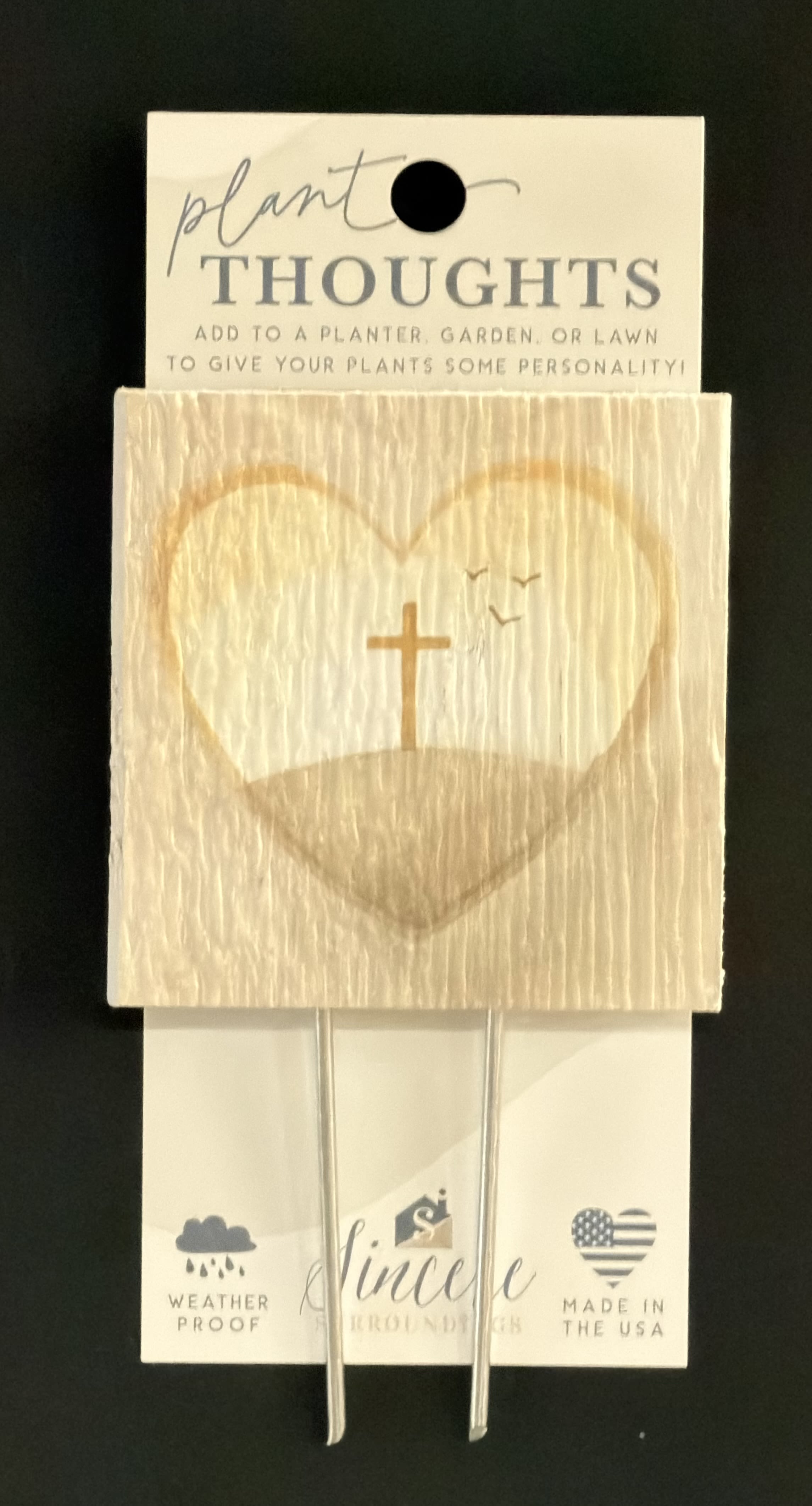 Plant Thoughts "Watercolor Cross Heart" - Thoughtful sentiment and functionality come together with plant thoughts! Plant thoughts are the perfect way to send beautiful and thoughtful words to someone.  The recipient can then infuse their garden and flowers or plants with love and meaning. They also offer up the perfect touch for floral gifts. Proudly designed, manufactured and printed in the USA. Size: 4" x 5.75" x .5"