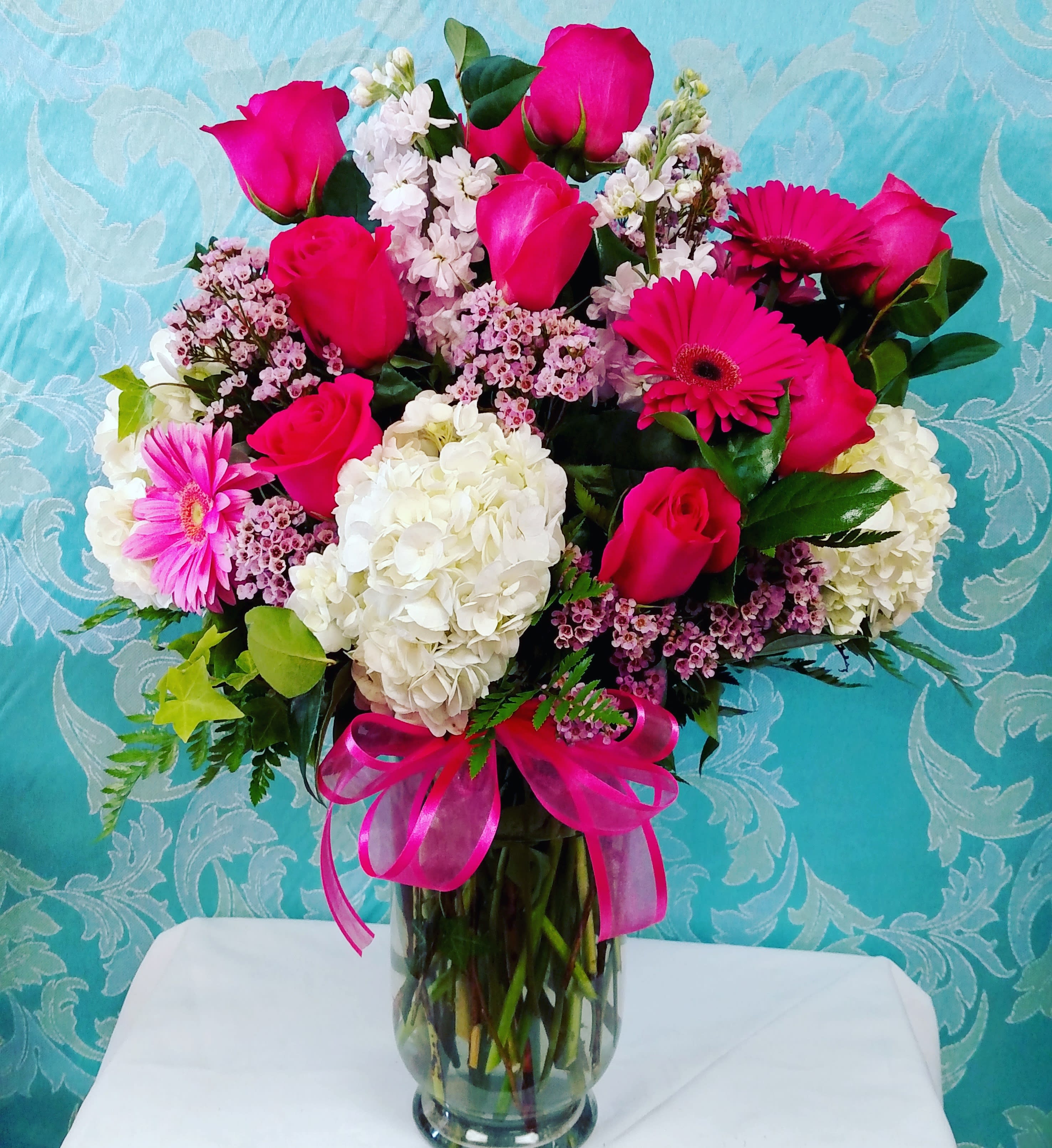 Glamorous Life Bouquet - Large vase Bouquet with hot or light pink roses, hot pink Gerberas, white hydrangea plus an array of pink fillers. For that Fabulous Lady in your life.