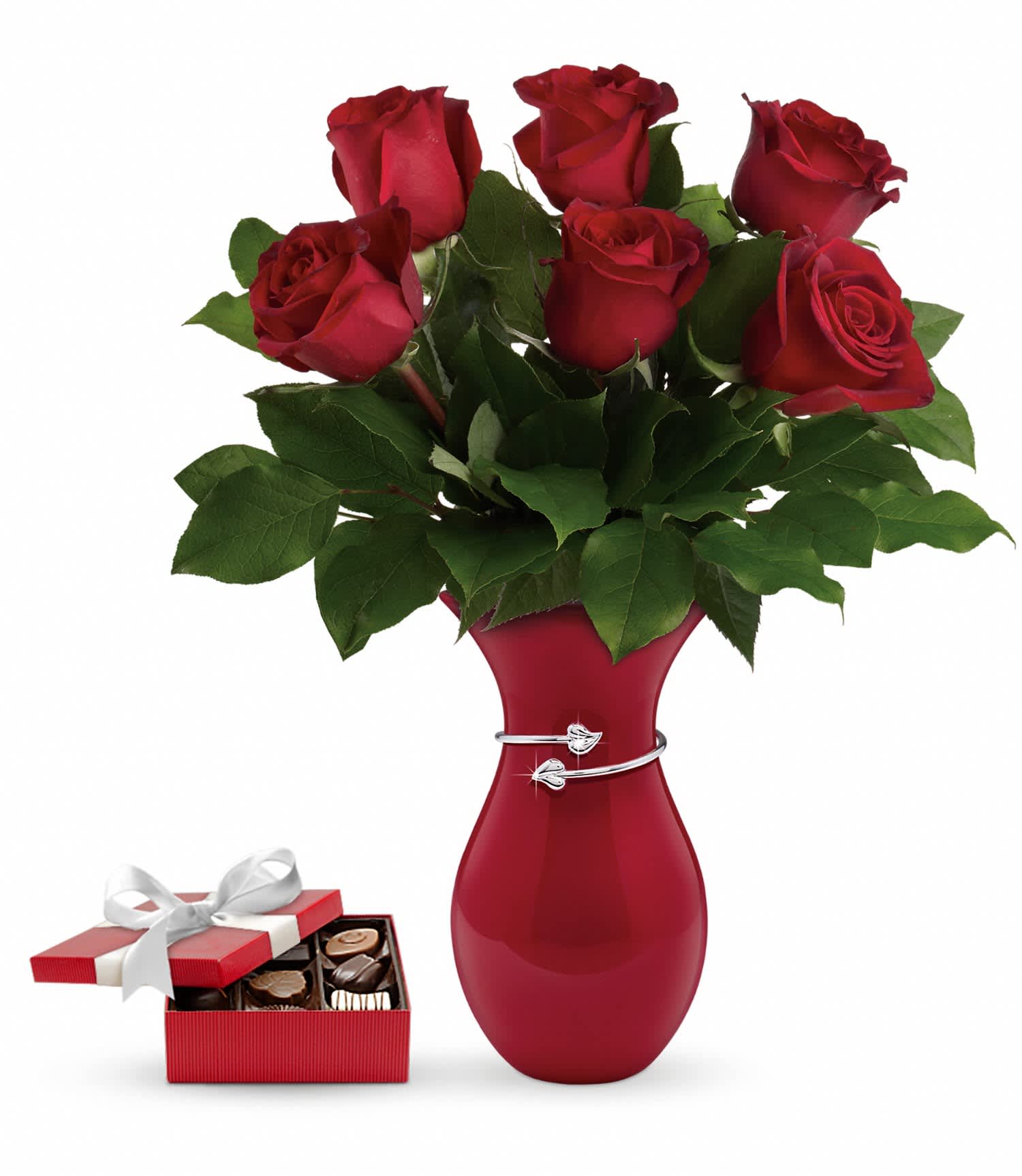 Gift From The Heart Bouquet with chocolates - This sweet gift set includes a delicious box of chocolates paired with a stunning bouquet. Make her heart beat a little faster with this showstopping testament to true love! Gorgeous red roses, hand-delivered in a beautiful red vase with a box of chocolates, will make this Valentine's Day one to remember.