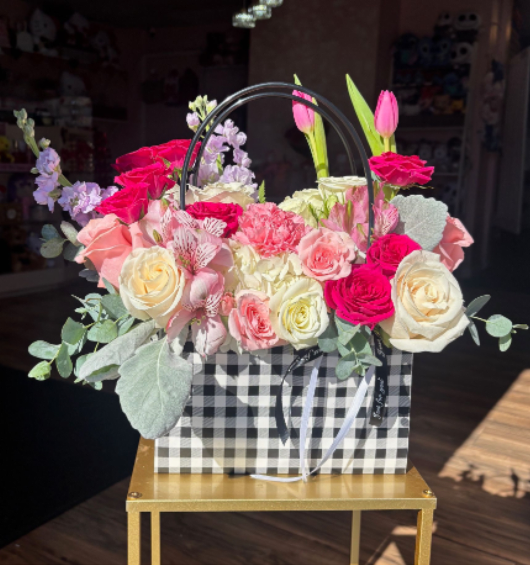 Enchanted Hot Pink Flower Tote - Super Fun Tote of flowers, modern style arrangement with all the elements needed in the inside like Floral foam water and Vitamin. Great for our Fashionistas