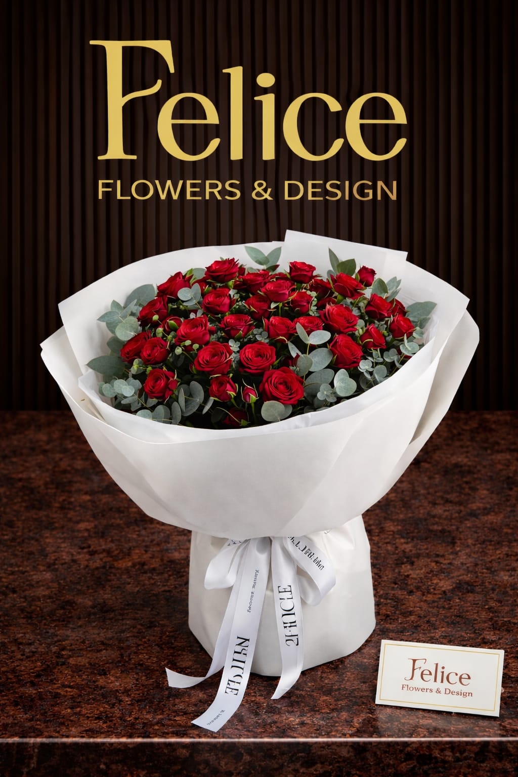 Crimson Elegance - Crimson Elegance is a luxurious red rose bouquet designed to make a bold romantic statement. Featuring premium red roses accented with fresh eucalyptus and wrapped in our signature Felice style, this arrangement is perfect for Valentine’s Day, anniversaries, and unforgettable moments. Handcrafted by our Los Angeles florist and available for same-day flower delivery.