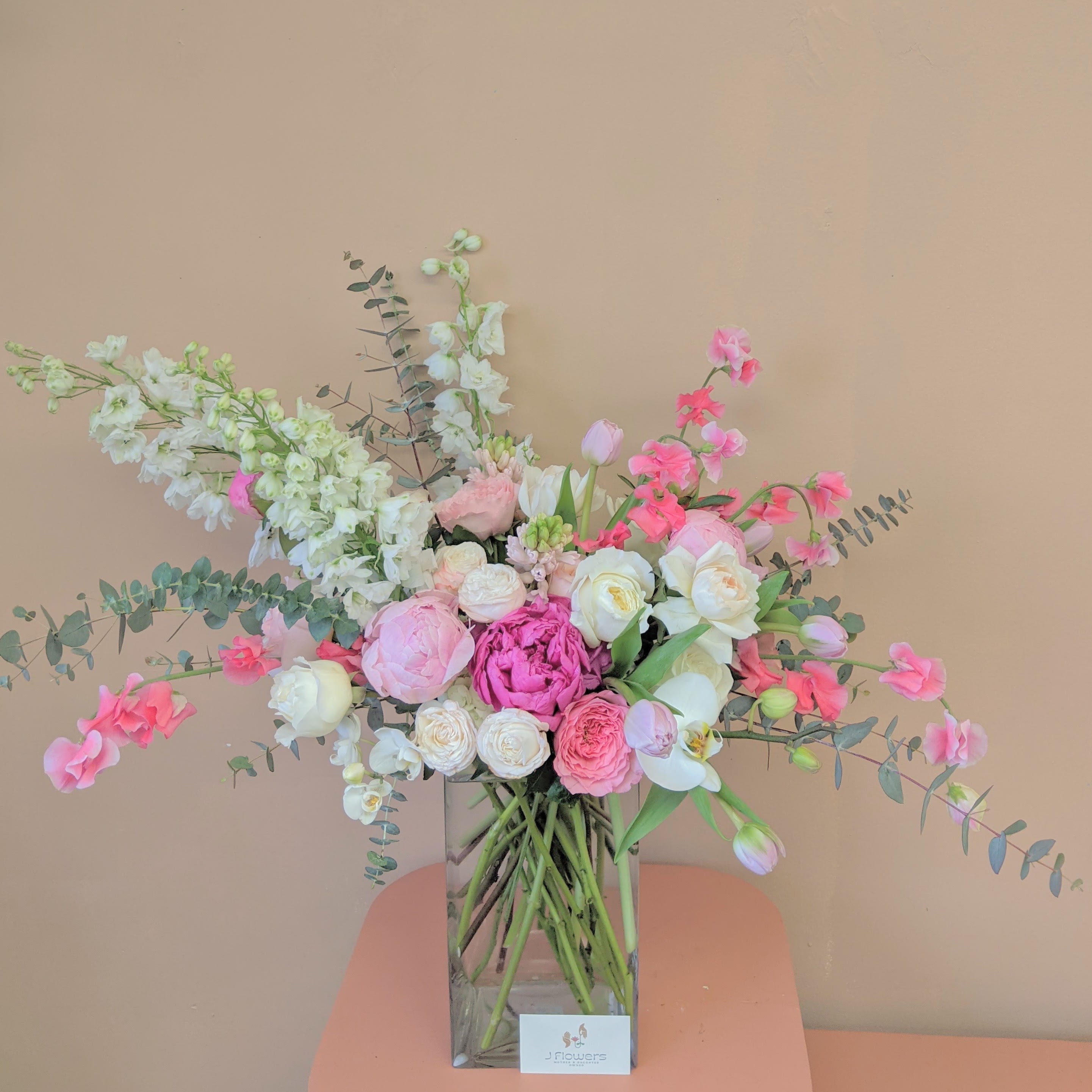 Love You Thiiiiiiiis Much - A wide spread organic shaped arrangement is sure to wow any lover!