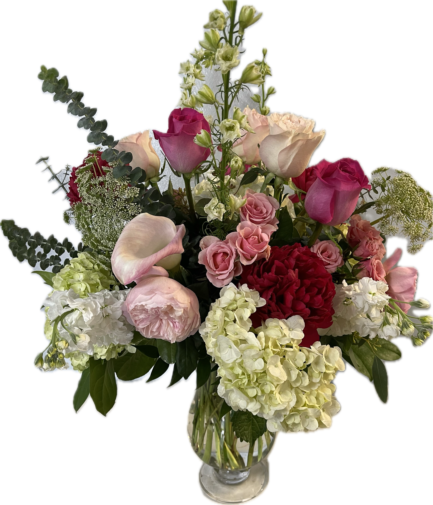 Hey, Hottie! - Breathtaking arrangement in clear stemmed glass vase. Roses, garden roses, spray roses,hydrangea, queen anne's lace, larkspur, stock, peonies and cala lilies. This will steal her heart!!!