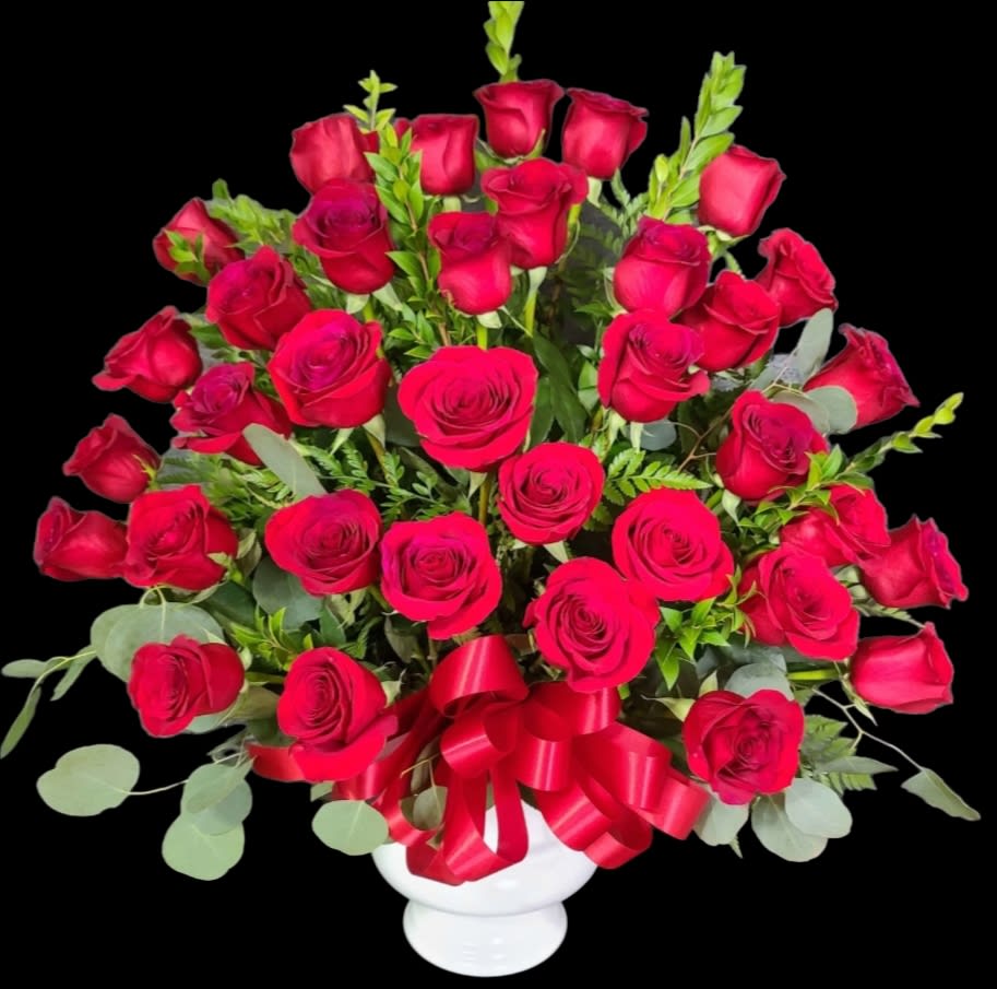 100 Rose Arrangement  - 100 Beautiful Premium Ecuadorian roses. This arrangement is approximately 24x24." At this price, it is available in red only. 