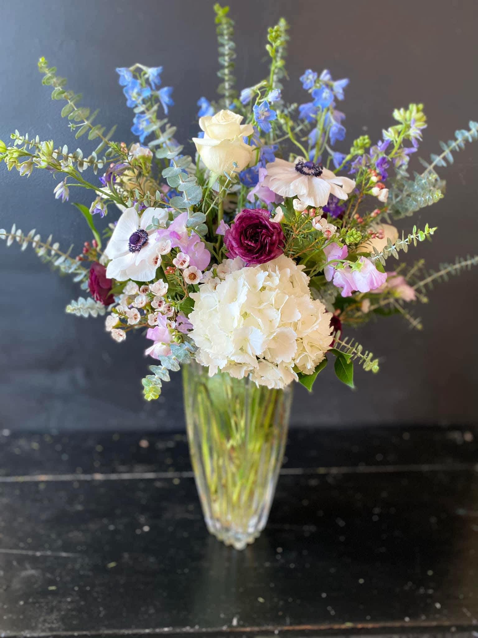 Garden vase of mixed blooms - Tall vase arrangement of seasonal local blooms